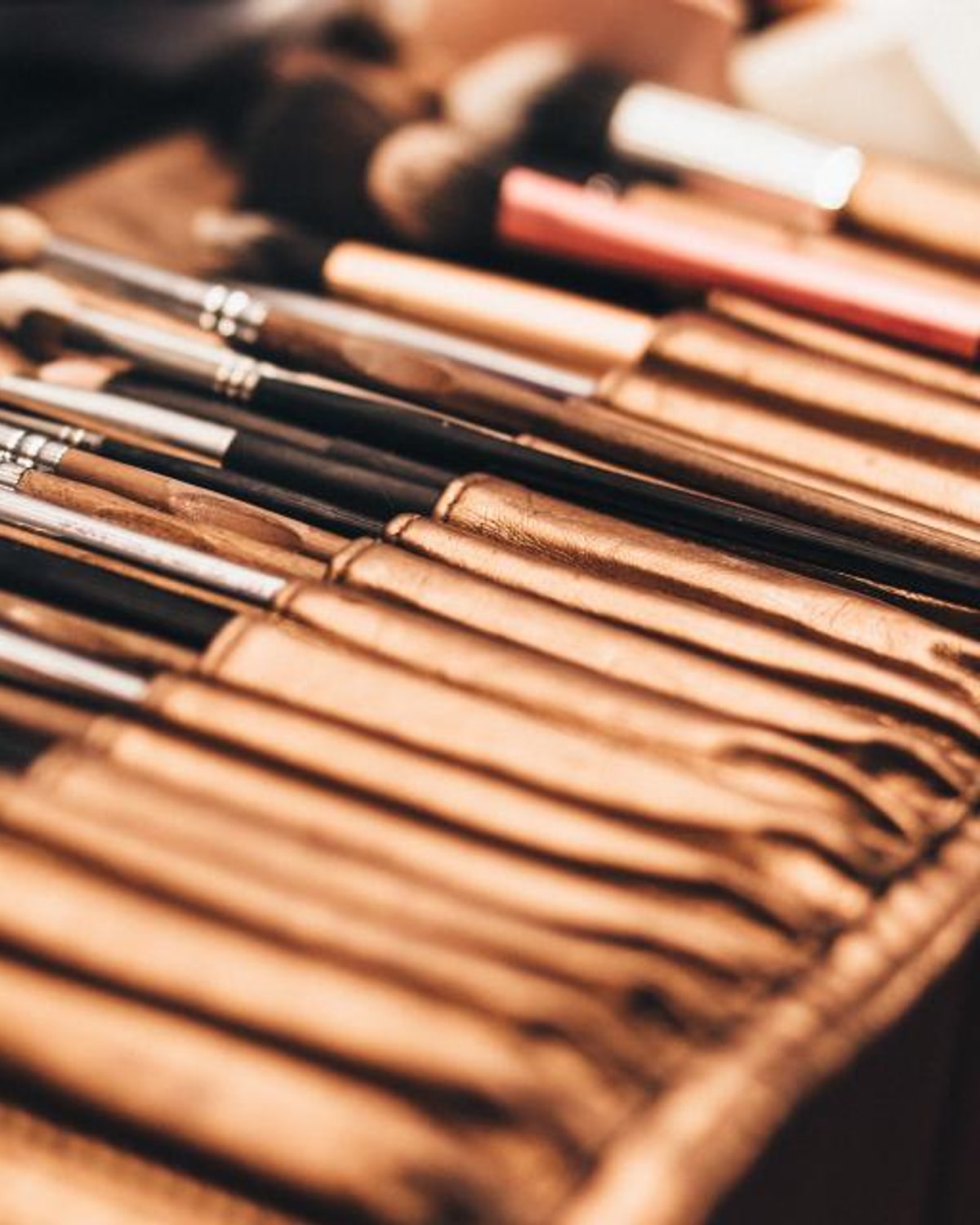 Makeup brushes arranged neatly on a table