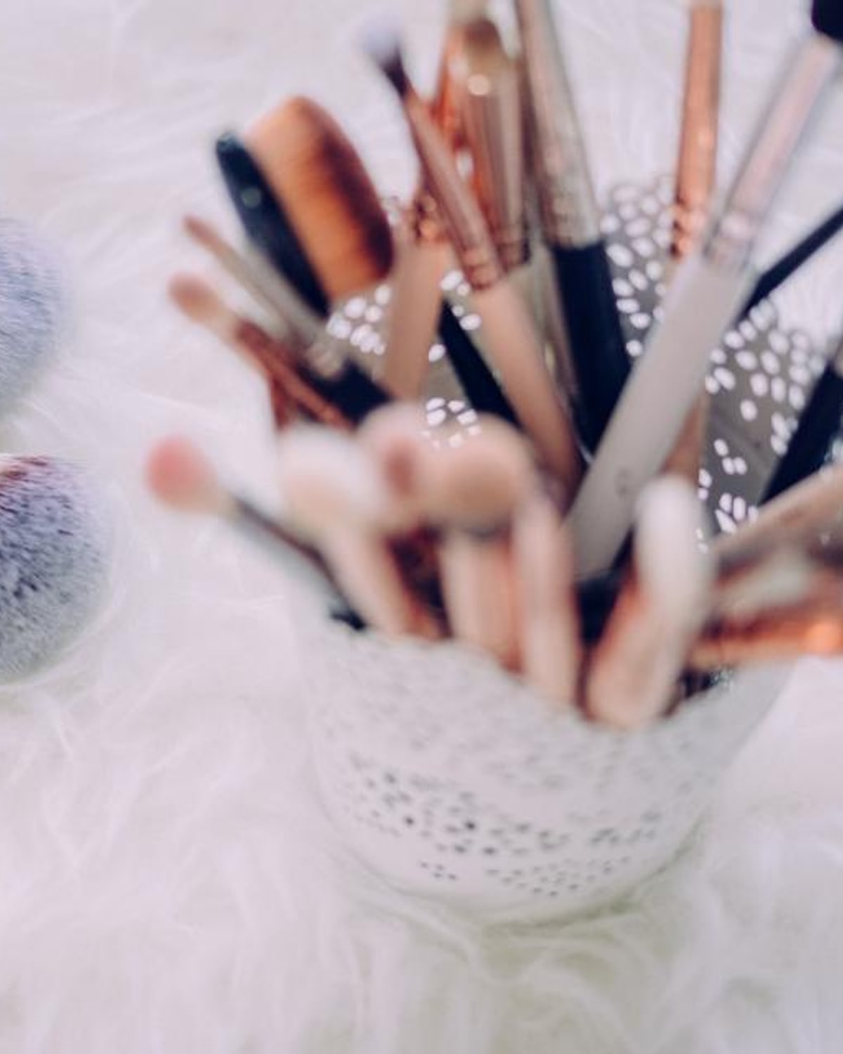 Compact travel beauty tools packed in a suitcase